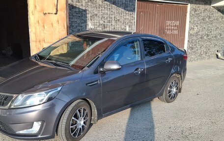 KIA Rio III рестайлинг, 2011 год, 850 000 рублей, 2 фотография