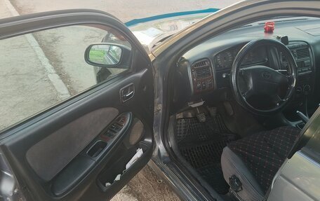 Toyota Avensis III рестайлинг, 2002 год, 400 000 рублей, 6 фотография