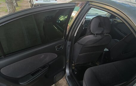 Toyota Avensis III рестайлинг, 2002 год, 400 000 рублей, 12 фотография