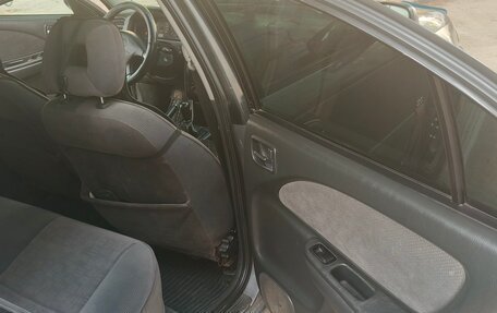 Toyota Avensis III рестайлинг, 2002 год, 400 000 рублей, 21 фотография