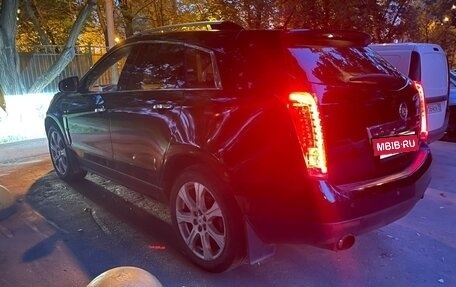 Cadillac SRX II рестайлинг, 2010 год, 1 090 000 рублей, 3 фотография