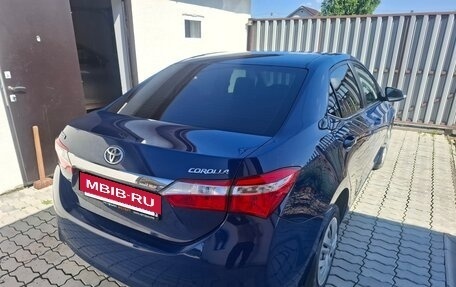 Toyota Corolla, 2013 год, 970 000 рублей, 4 фотография
