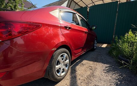 Hyundai Solaris II рестайлинг, 2011 год, 650 000 рублей, 24 фотография
