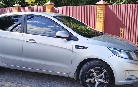 KIA Rio III рестайлинг, 2012 год, 700 000 рублей, 15 фотография