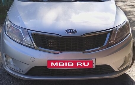 KIA Rio III рестайлинг, 2012 год, 700 000 рублей, 14 фотография