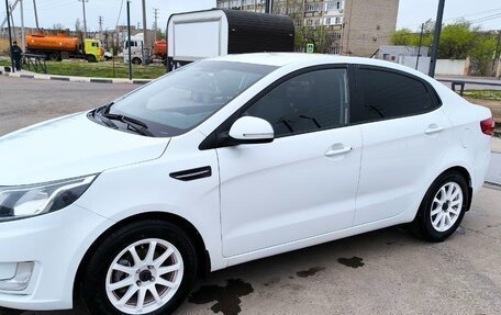 KIA Rio III рестайлинг, 2012 год, 949 000 рублей, 9 фотография