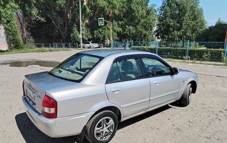 Mazda Familia, 2003 год, 410 000 рублей, 12 фотография