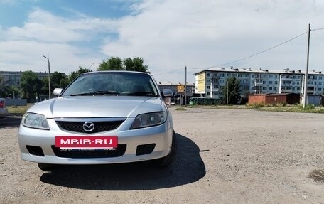 Mazda Familia, 2003 год, 410 000 рублей, 9 фотография