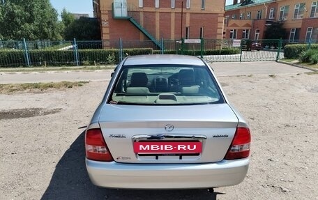 Mazda Familia, 2003 год, 410 000 рублей, 13 фотография