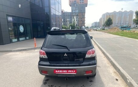 Mitsubishi Outlander III рестайлинг 3, 2004 год, 600 000 рублей, 4 фотография