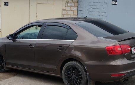 Volkswagen Jetta VI, 2011 год, 1 150 000 рублей, 4 фотография
