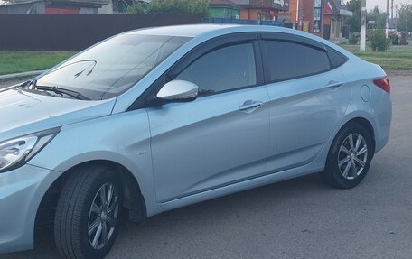 Hyundai Solaris II рестайлинг, 2011 год, 750 000 рублей, 14 фотография