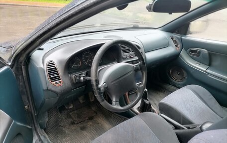 Mazda 323, 1995 год, 300 000 рублей, 9 фотография