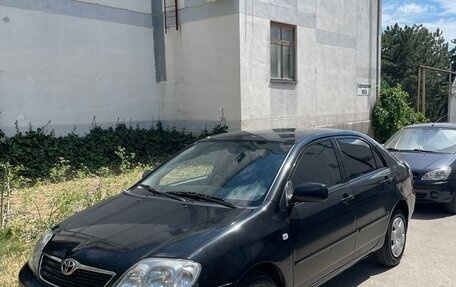 Toyota Corolla, 2004 год, 699 000 рублей, 1 фотография