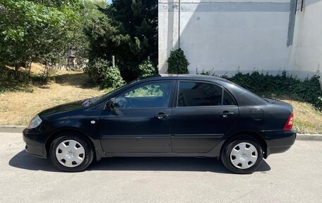 Toyota Corolla, 2004 год, 699 000 рублей, 3 фотография