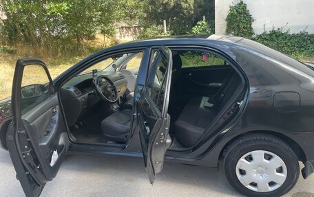 Toyota Corolla, 2004 год, 699 000 рублей, 8 фотография