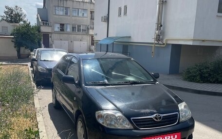 Toyota Corolla, 2004 год, 699 000 рублей, 10 фотография