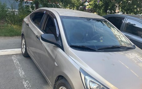 Hyundai Solaris II рестайлинг, 2011 год, 660 000 рублей, 4 фотография