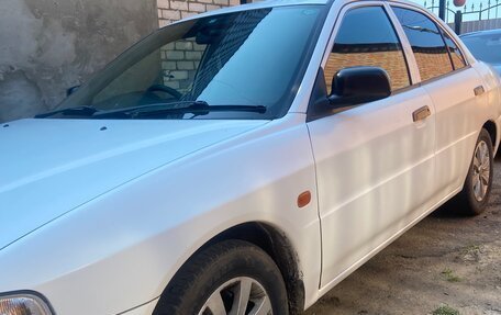 Mitsubishi Mirage VI рестайлинг, 1999 год, 310 000 рублей, 3 фотография