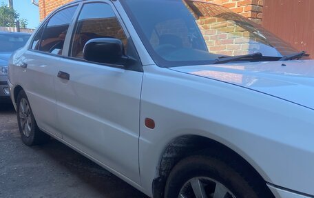 Mitsubishi Mirage VI рестайлинг, 1999 год, 310 000 рублей, 4 фотография