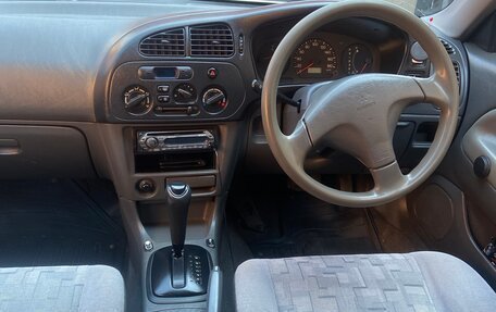 Mitsubishi Mirage VI рестайлинг, 1999 год, 310 000 рублей, 5 фотография