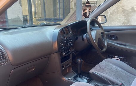 Mitsubishi Mirage VI рестайлинг, 1999 год, 310 000 рублей, 7 фотография