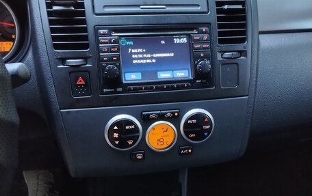 Nissan Tiida, 2010 год, 900 000 рублей, 8 фотография