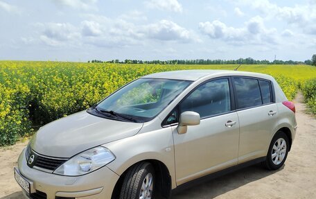 Nissan Tiida, 2010 год, 900 000 рублей, 9 фотография