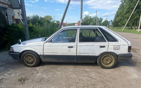 Mazda Familia, 1987 год, 249 000 рублей, 3 фотография