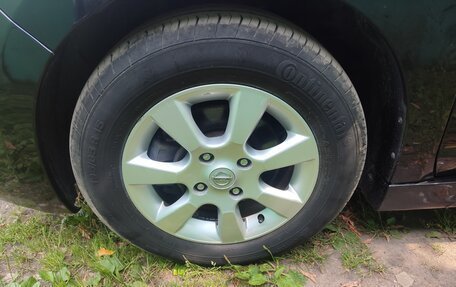 Nissan Tiida, 2010 год, 920 000 рублей, 32 фотография