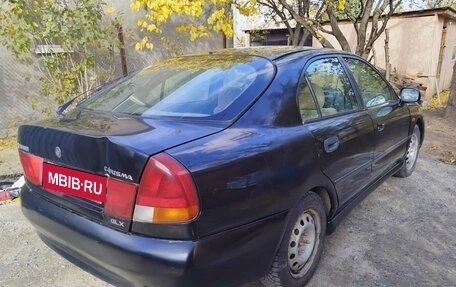 Mitsubishi Carisma I, 1995 год, 160 000 рублей, 1 фотография