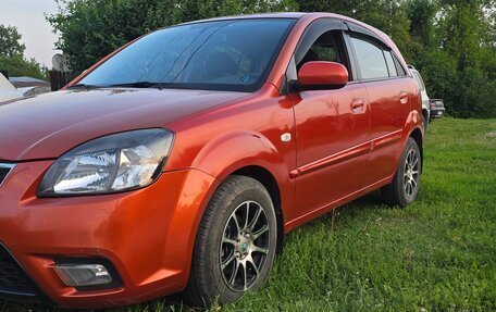 KIA Rio II, 2011 год, 1 050 000 рублей, 10 фотография