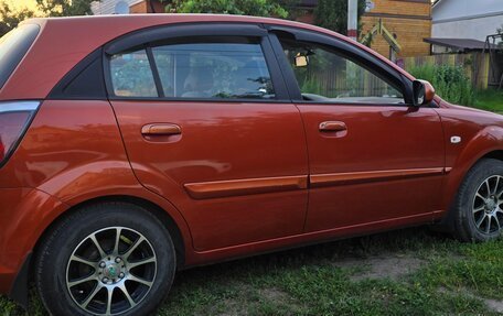 KIA Rio II, 2011 год, 1 050 000 рублей, 18 фотография
