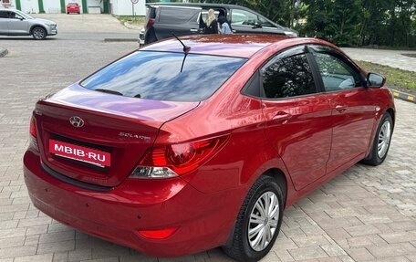 Hyundai Solaris II рестайлинг, 2011 год, 745 000 рублей, 14 фотография