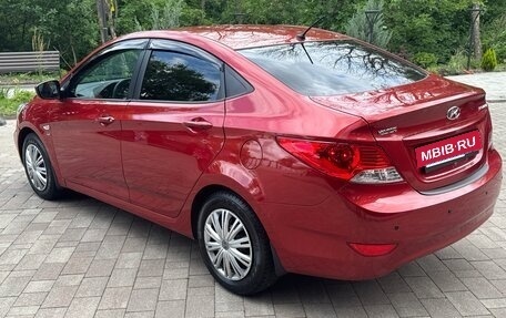 Hyundai Solaris II рестайлинг, 2011 год, 745 000 рублей, 18 фотография