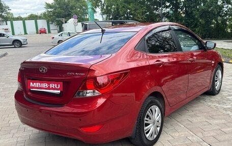 Hyundai Solaris II рестайлинг, 2011 год, 745 000 рублей, 13 фотография