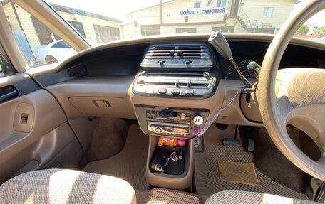 Toyota Estima III рестайлинг -2, 1995 год, 620 000 рублей, 27 фотография