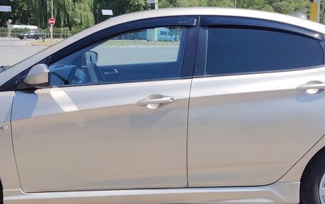 Hyundai Solaris II рестайлинг, 2011 год, 777 000 рублей, 9 фотография