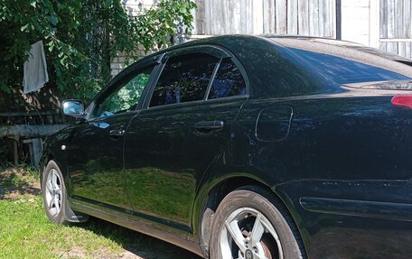 Toyota Avensis III рестайлинг, 2004 год, 600 000 рублей, 10 фотография