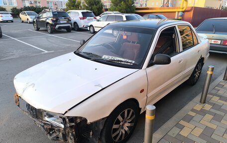 Mitsubishi Lancer VII, 1991 год, 135 000 рублей, 3 фотография