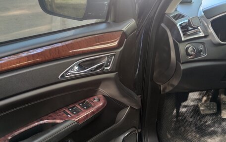 Cadillac SRX II рестайлинг, 2013 год, 1 983 000 рублей, 24 фотография
