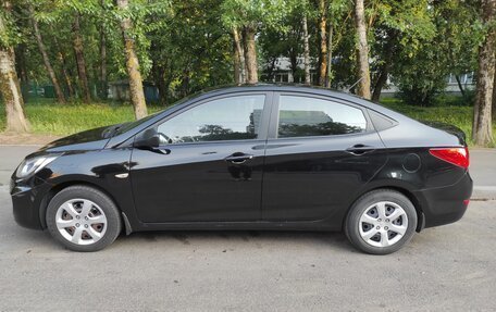Hyundai Solaris II рестайлинг, 2011 год, 700 000 рублей, 4 фотография