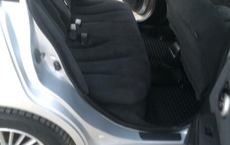 Nissan Tiida, 2010 год, 850 000 рублей, 9 фотография