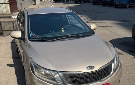 KIA Rio III рестайлинг, 2011 год, 670 000 рублей, 18 фотография