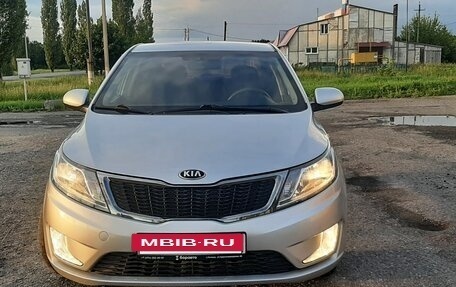 KIA Rio III рестайлинг, 2013 год, 915 000 рублей, 2 фотография