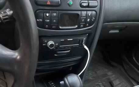 Mitsubishi Carisma I, 1998 год, 100 000 рублей, 13 фотография