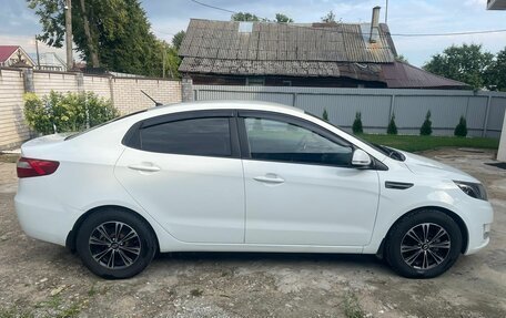 KIA Rio III рестайлинг, 2013 год, 756 000 рублей, 2 фотография