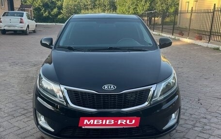 KIA Rio III рестайлинг, 2012 год, 900 000 рублей, 4 фотография