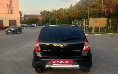Renault Sandero I, 2013 год, 670 000 рублей, 2 фотография