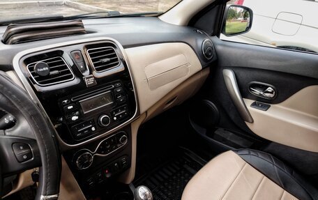 Renault Logan II, 2014 год, 750 000 рублей, 11 фотография